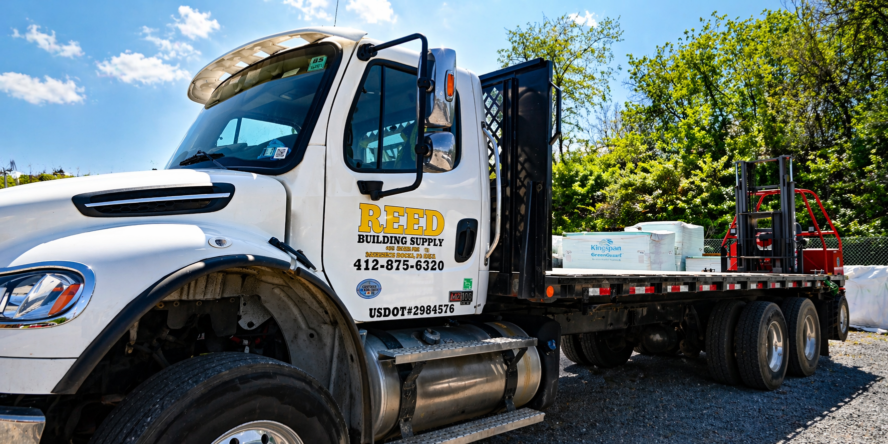 Reed Building Supply delivery truck loaded with Kingspan insulation